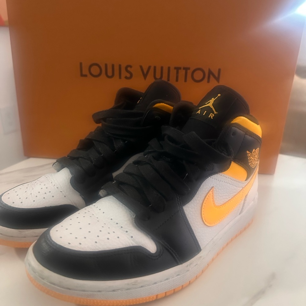 Nike Air Jordan Sneakers in Black, White, and Yellow